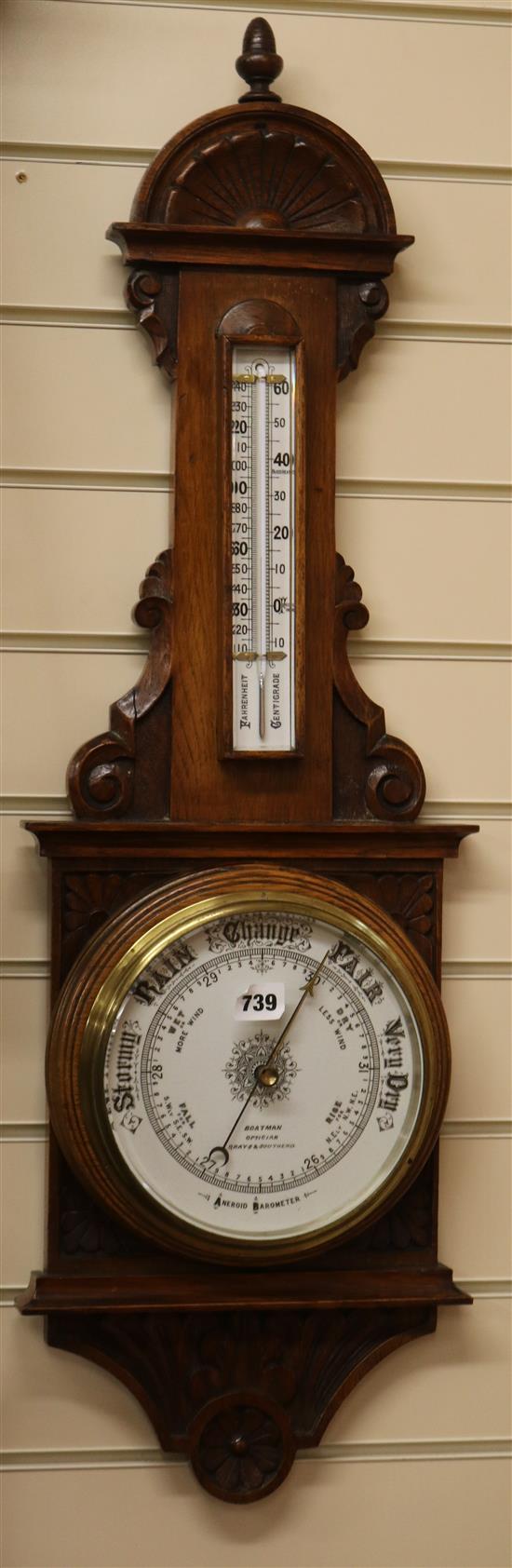 An oak aneroid barometer